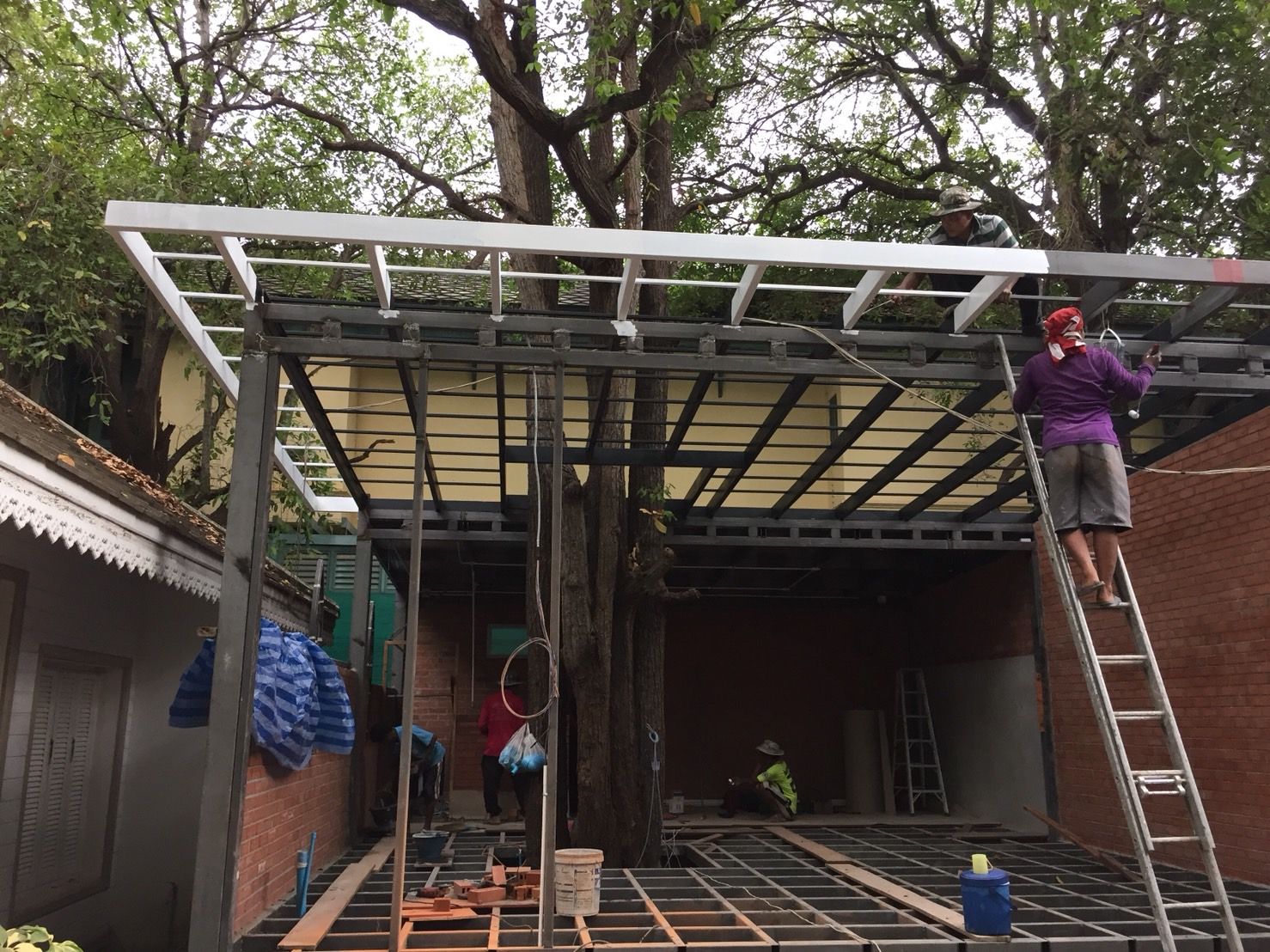 D-Built team installing a steel roof frame on site in Hua Hin